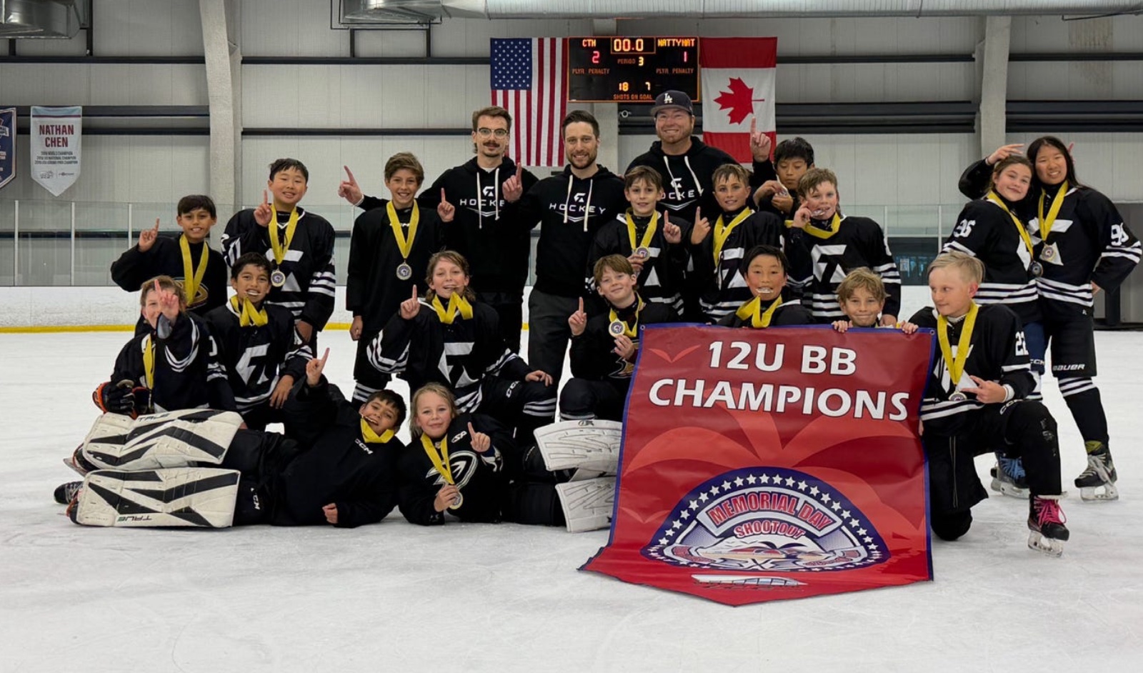 Coach Tony with his 12U BB championship team on the ice